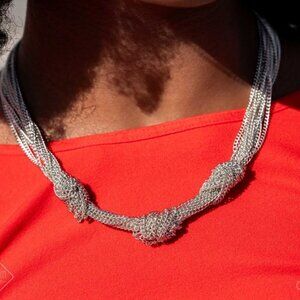 Silver tone multi strand knotted necklace